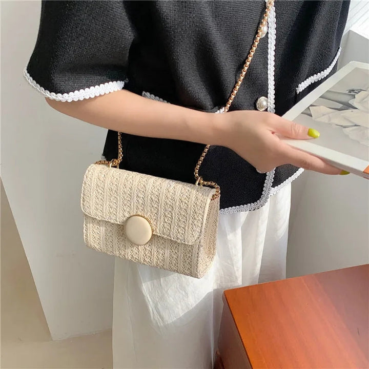 Nina - Bolso de hombro con solapa y forma rectangular