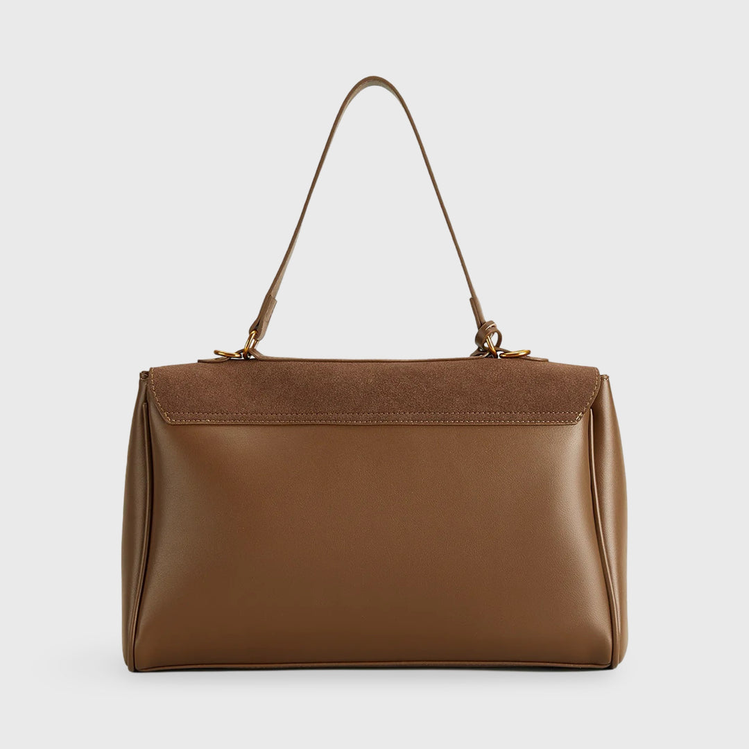 Kira | Bolsa Premium