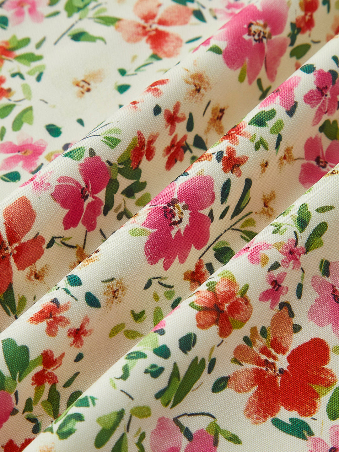Jan | Vestido midi sin mangas con acabado floral, corte ligero