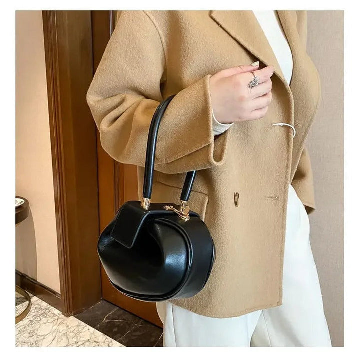 Sherry | Bolso de mano mini redondo con asa elegante y estiloso