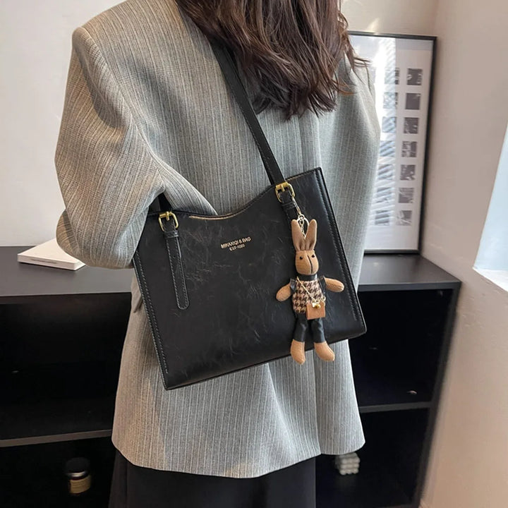 Zara | Elegante bolso de cuero + perchero para bolso gratuito
