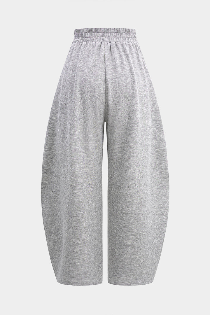 Naomi | Pantalones de mujer con piernas anchas y pliegues, diseño elegante