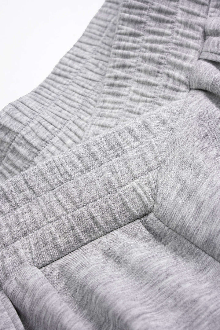 Naomi | Pantalones de mujer con piernas anchas y pliegues, diseño elegante