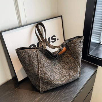Evie - Bolso de mano de mujer con estampado de leopardo.