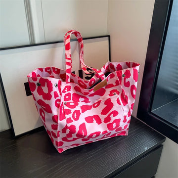 Evie - Bolso de mano de mujer con estampado de leopardo.