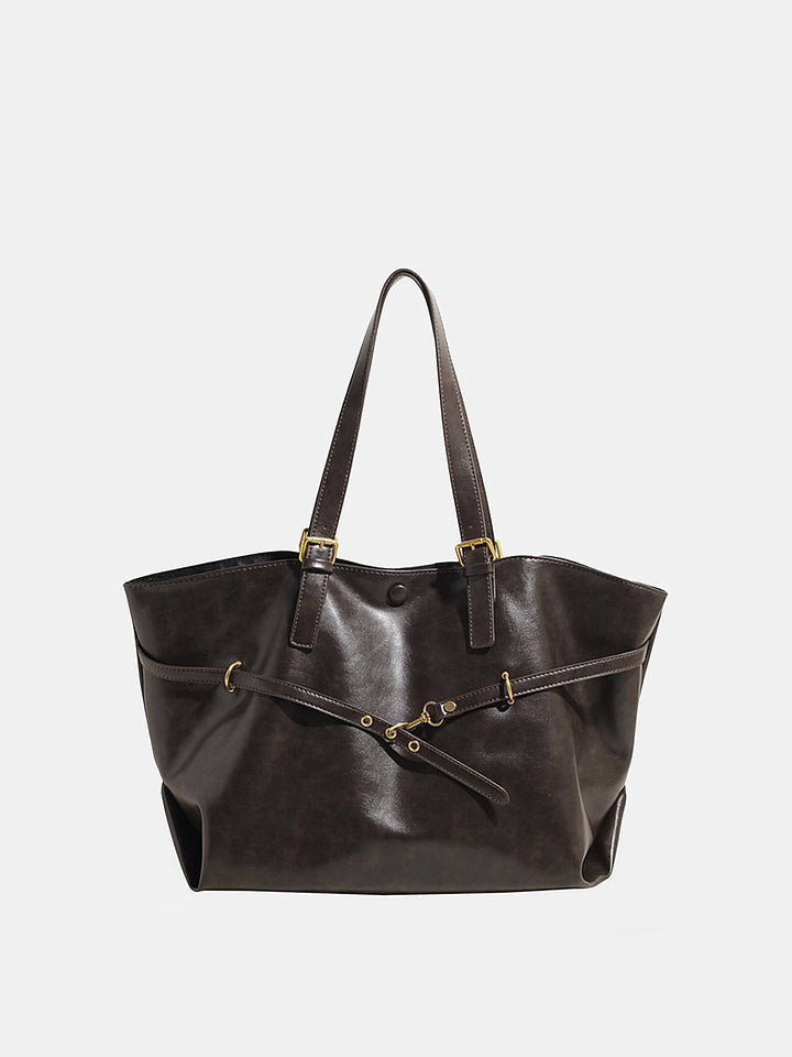 Iris | Bolsa shopper con tiras decorativas y hebillas, elegante y espaciosa