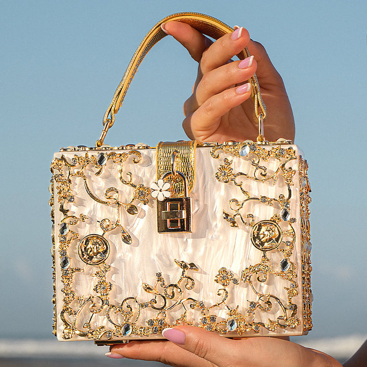 Cathy | Bolsa de caja exclusiva, diseño de lujo, detalles florales dorados, elegante cierre metálico