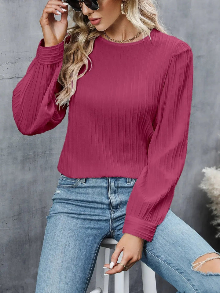 Violette - Blusa blanca con mangas abullonadas