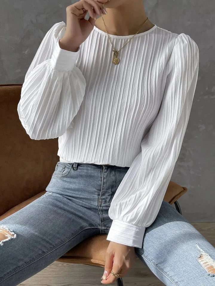 Violette - Blusa blanca con mangas abullonadas