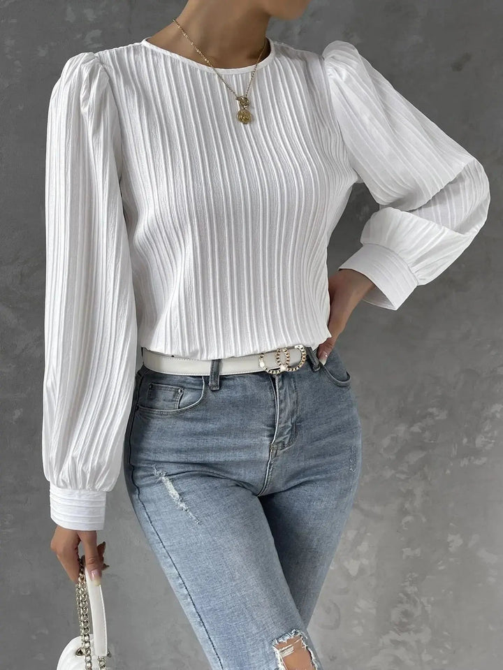 Violette - Blusa blanca con mangas abullonadas