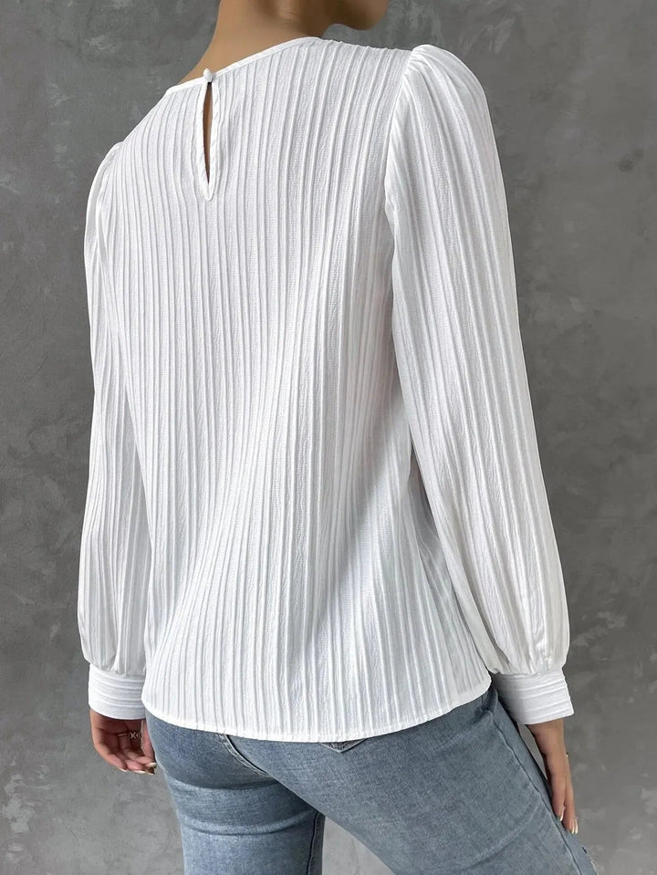Violette - Blusa blanca con mangas abullonadas