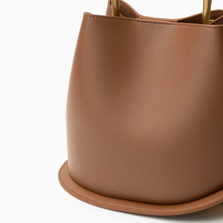 Magda | Elegante bolso de mujer, asas geométricas y base redonda